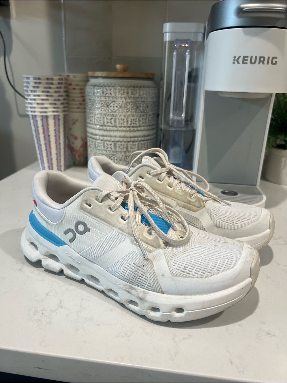 On Running White Sneakers with Blue Accent